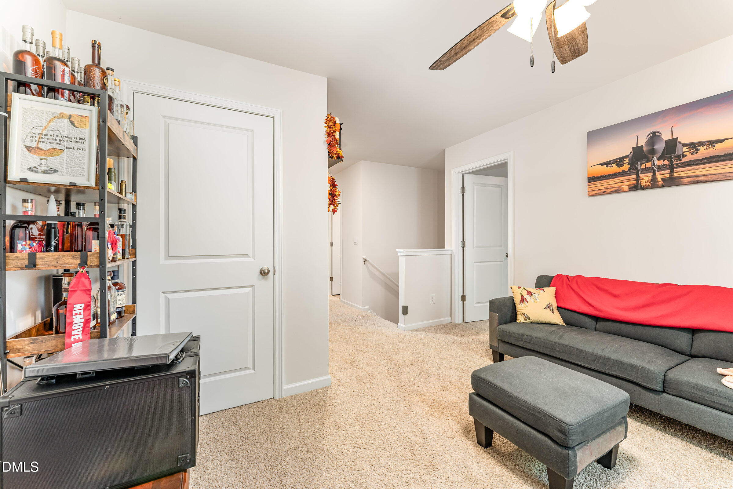 5496 Carolines Way Wilson, NC 27893 - Photo 28 of 71 a living room with furniture and wooden floor
