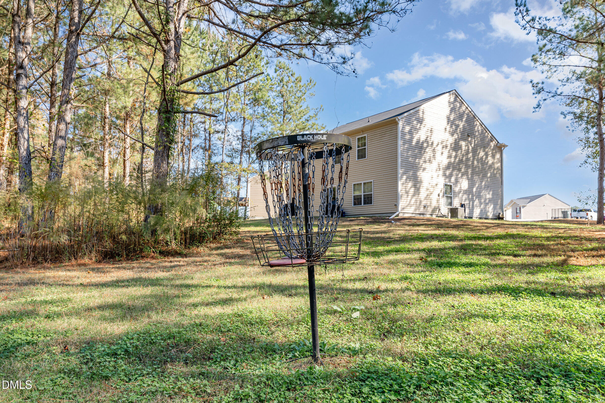 5496 Carolines Way Wilson, NC 27893 - Photo 43 of 71 a view of a big yard with large tree