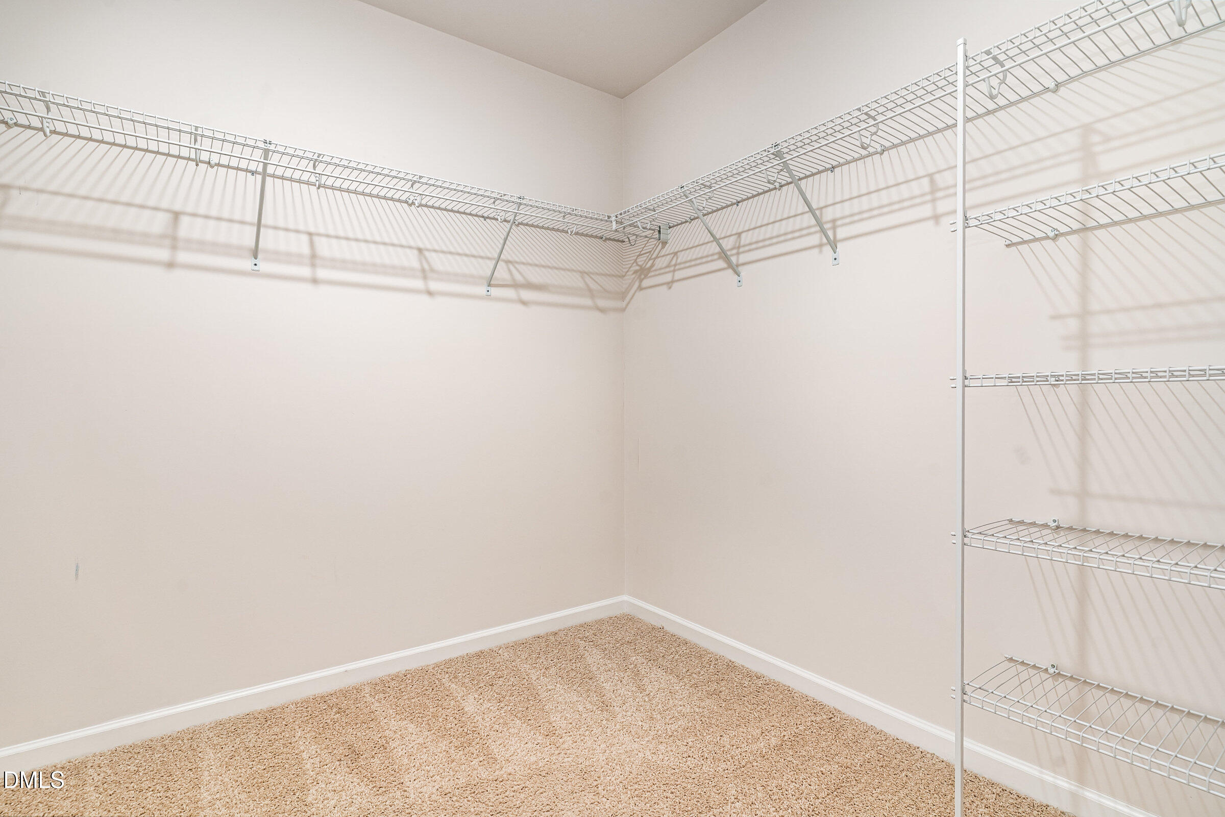 5496 Carolines Way Wilson, NC 27893 - Photo 57 of 71 a view of a room with racks on the wall