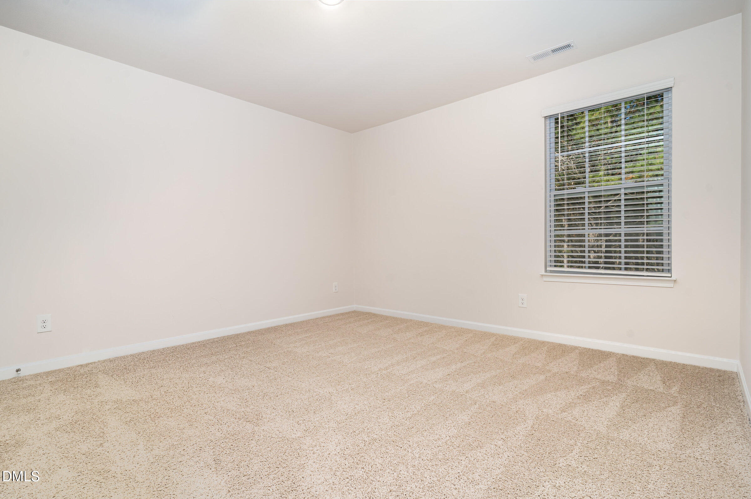 5496 Carolines Way Wilson, NC 27893 - Photo 60 of 71 an empty room with windows