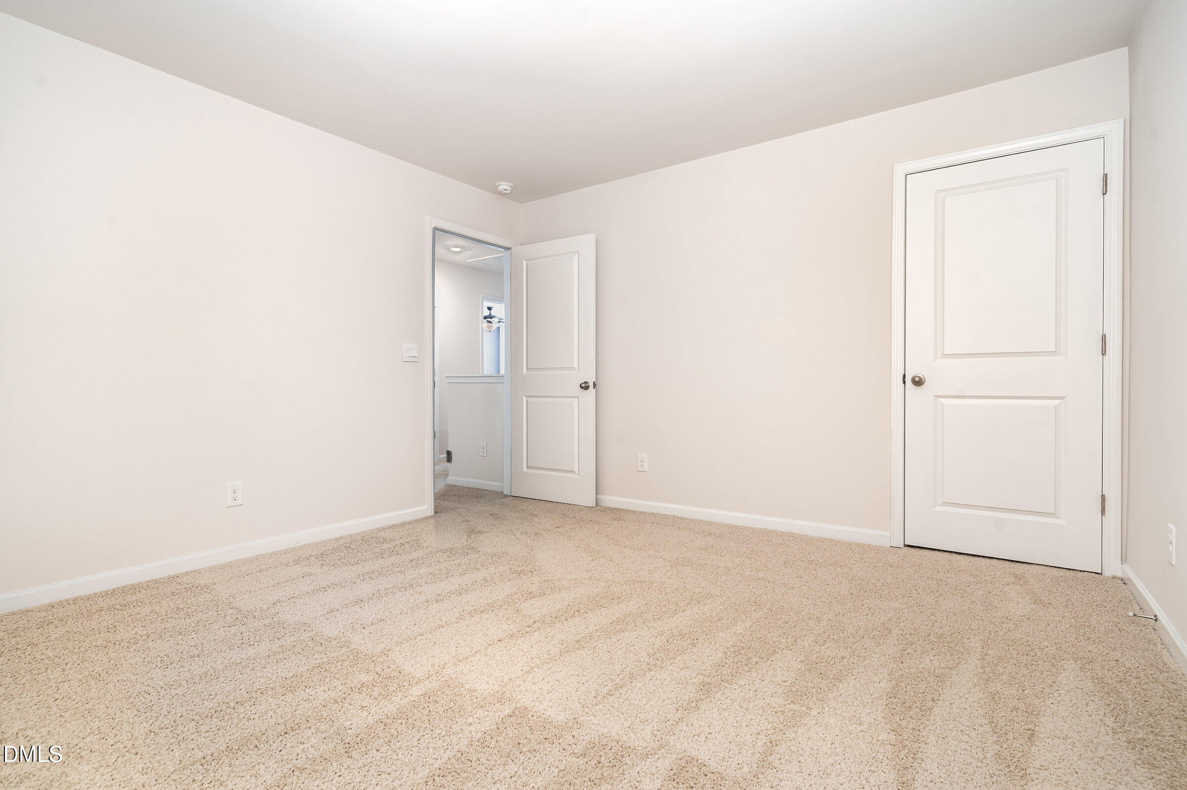 5496 Carolines Way Wilson, NC 27893 - Photo 61 of 71 an empty room with an entryway