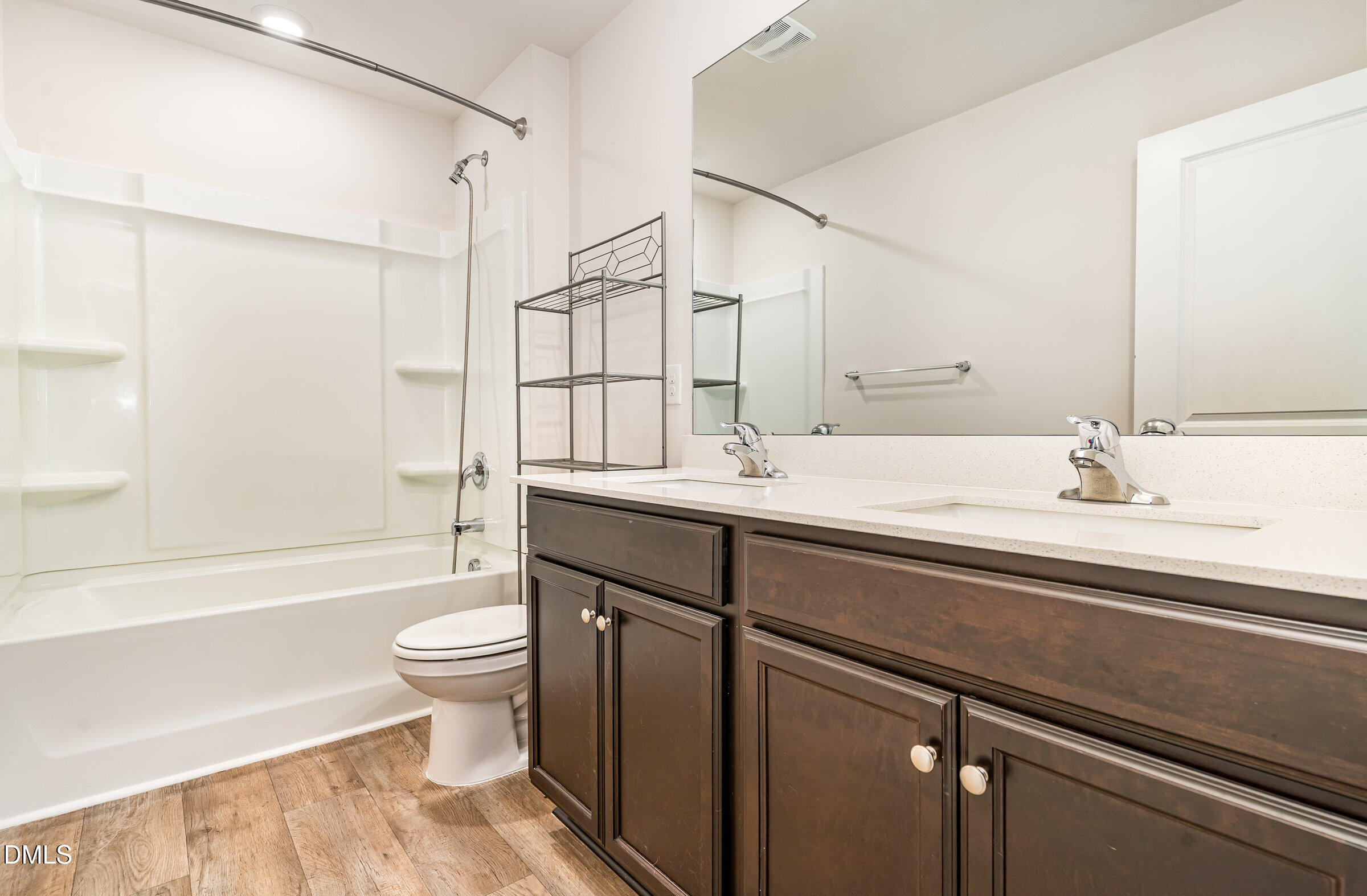 5496 Carolines Way Wilson, NC 27893 - Photo 62 of 71 a bathroom with a sink a toilet and shower