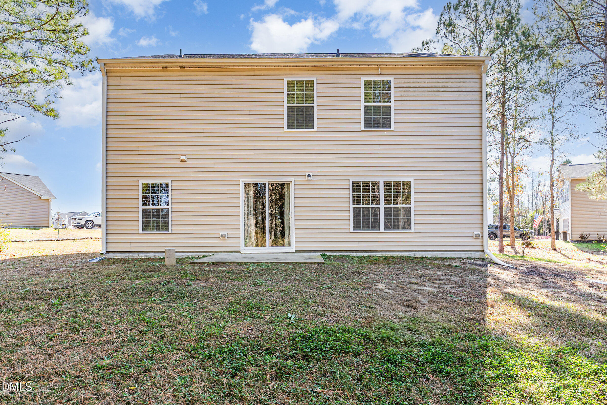 5496 Carolines Way Wilson, NC 27893 - Photo 68 of 71 a front view of a house with a yard