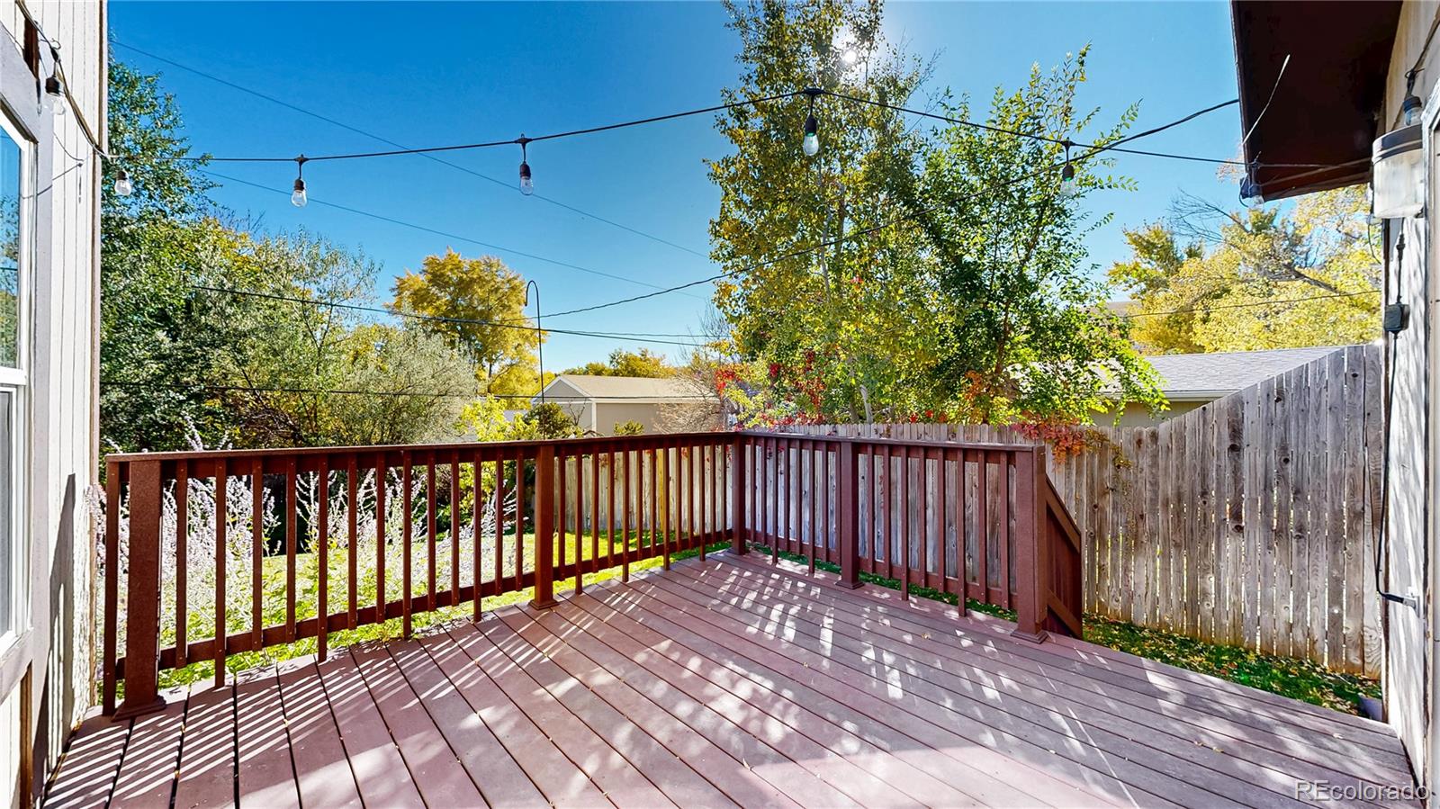 214 Poppy Street Golden, CO 80401 - Photo 21 of 31 a view of balcony with wooden floor