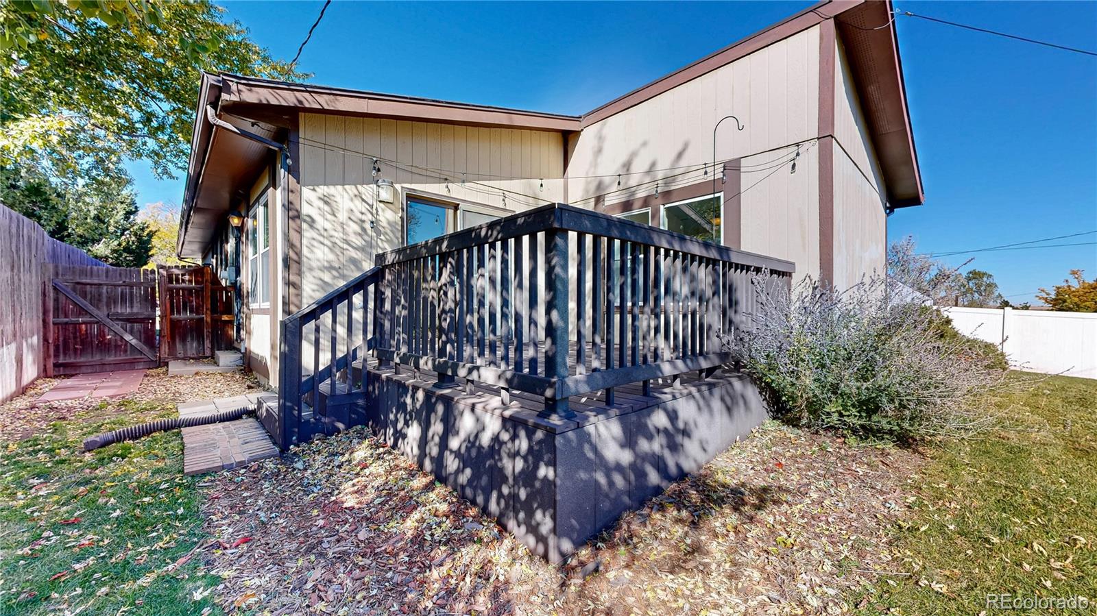 214 Poppy Street Golden, CO 80401 - Photo 22 of 31 a view of a house with a yard