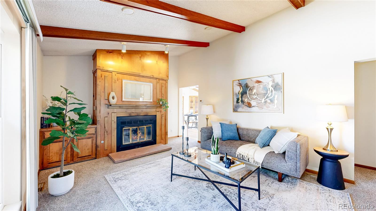 214 Poppy Street Golden, CO 80401 - Photo 7 of 31 a living room with furniture and a fireplace