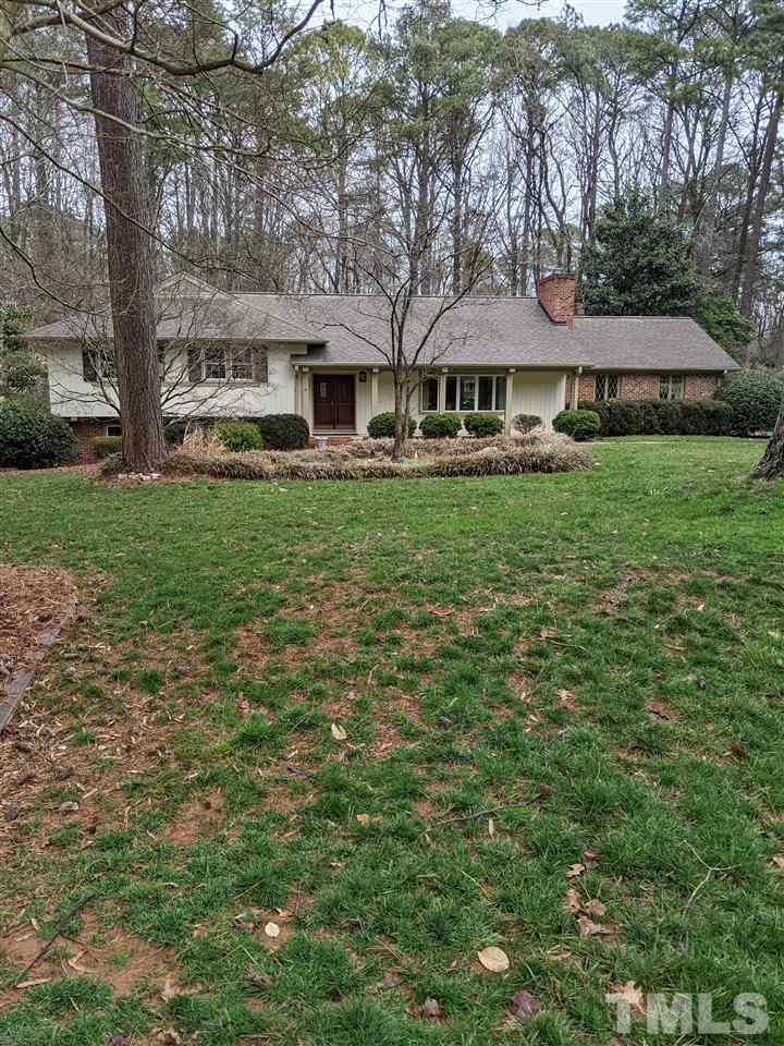 8804 Oneal Road Raleigh, NC 27613 - Photo 1 of 11 a front view of a house with garden