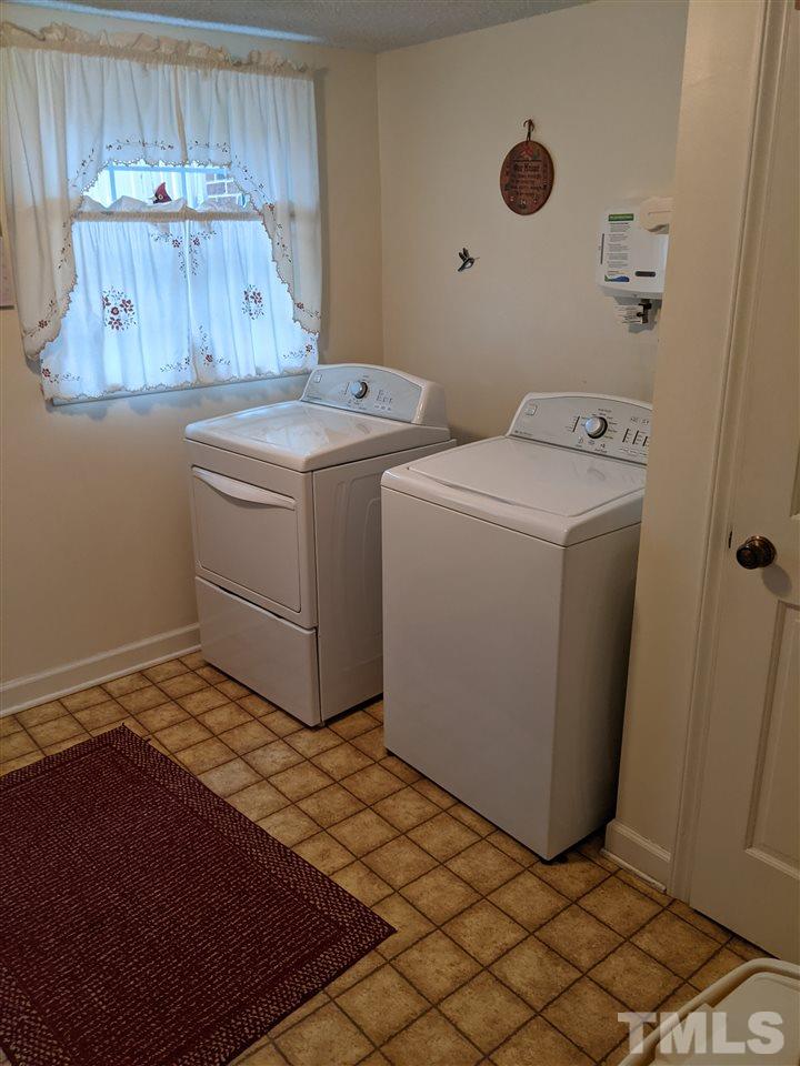 8804 Oneal Road Raleigh, NC 27613 - Photo 11 of 11 a utility room with dryer and washer