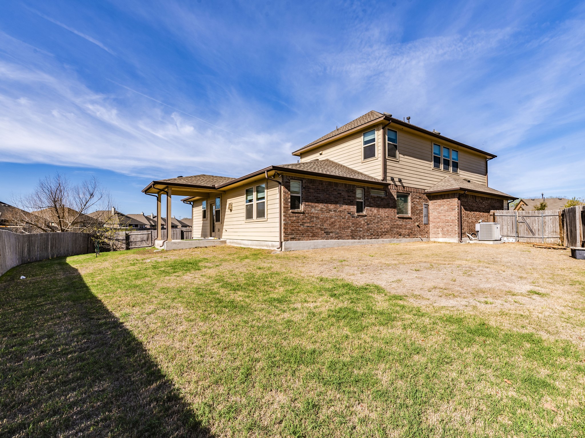 6829 Banff Cove Austin, TX 78754 - Photo 34 of 39 a front view of a house with a yard