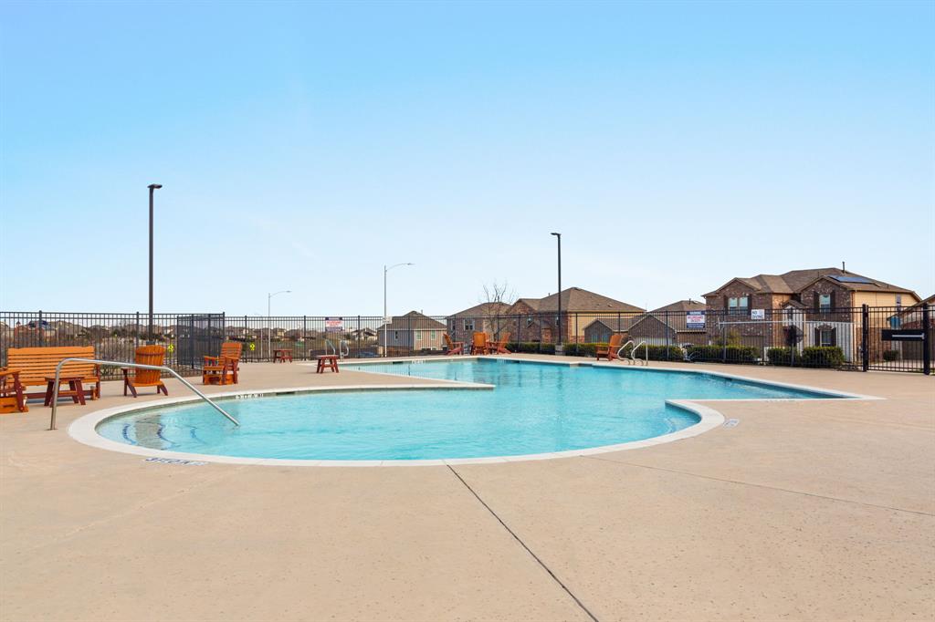 6829 Banff Cove Austin, TX 78754 - Photo 37 of 39 a view of a swimming pool with a yard