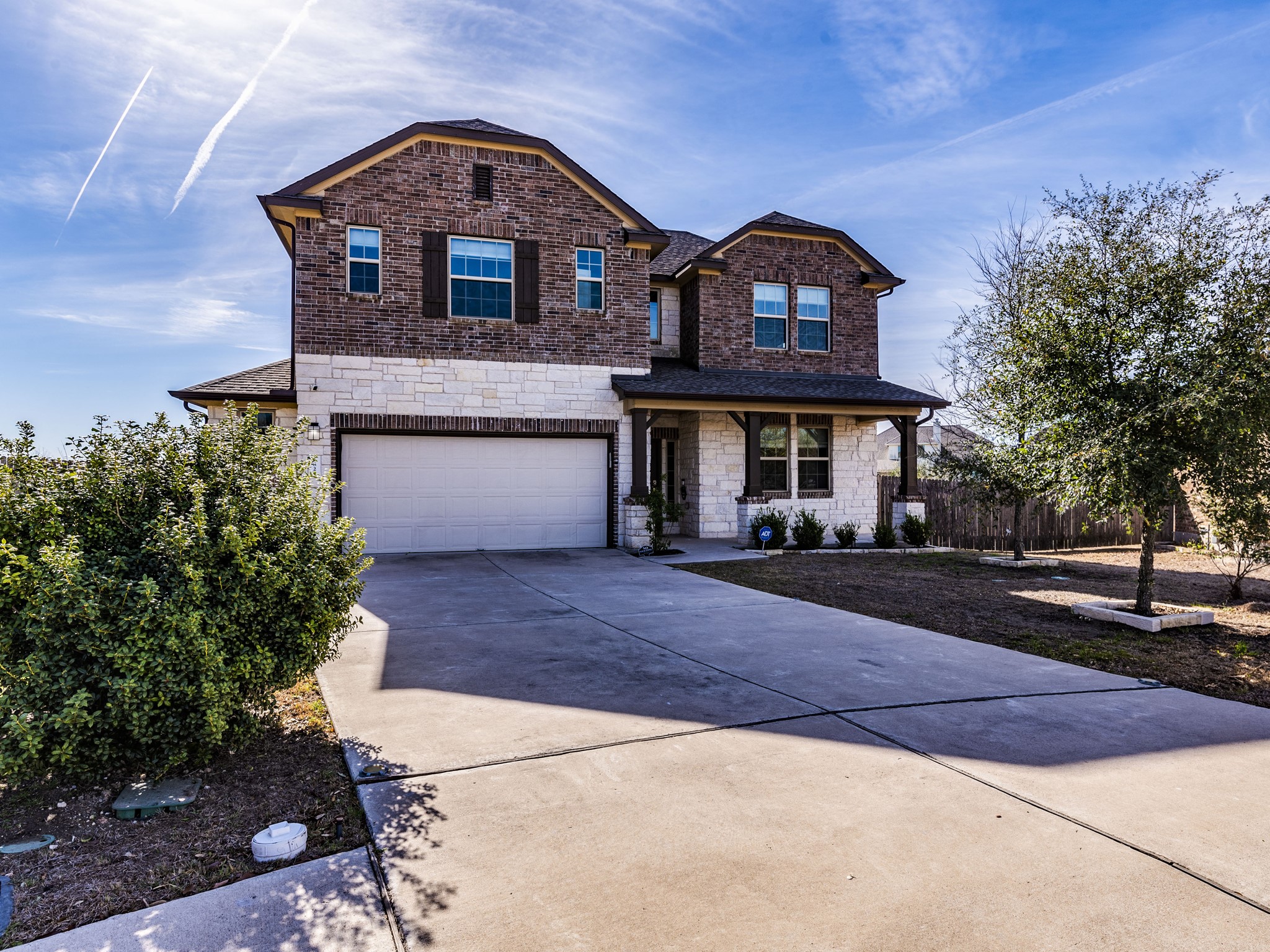 6829 Banff Cove Austin, TX 78754 - Photo 39 of 39 a front view of a house with a yard