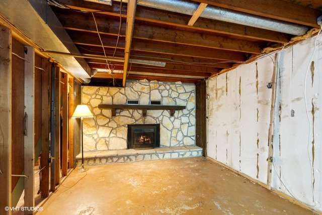 15809 Maple Park Road Maple Park, IL 60151 - Photo 14 of 19 a view of an empty room with a fireplace