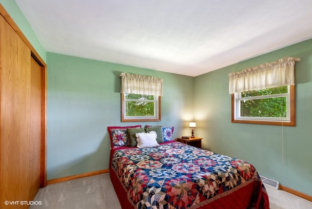15809 Maple Park Road Maple Park, IL 60151 - Photo 8 of 19 a bedroom with a bed and window