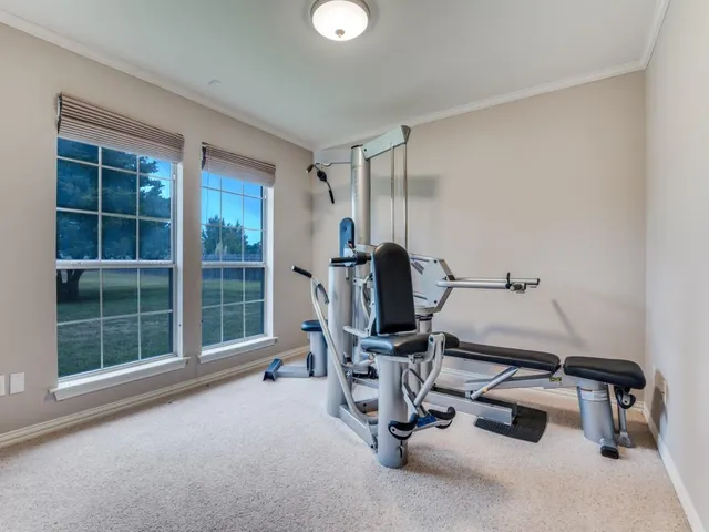 a view of a workspace with gym equipment