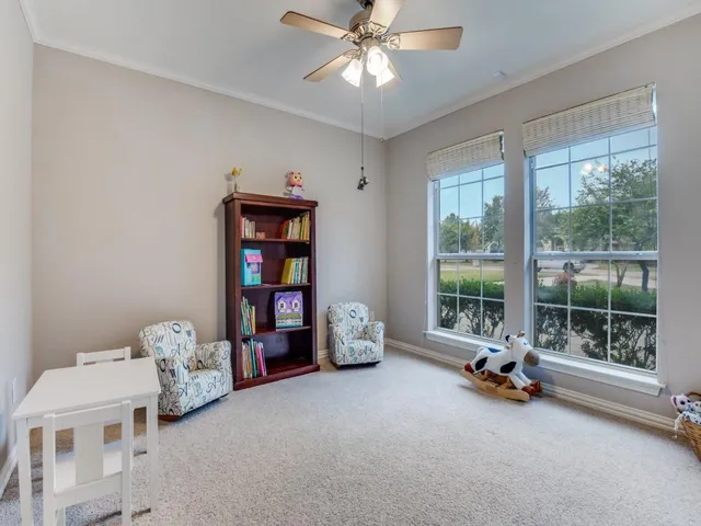 a room with toys and a chandelier