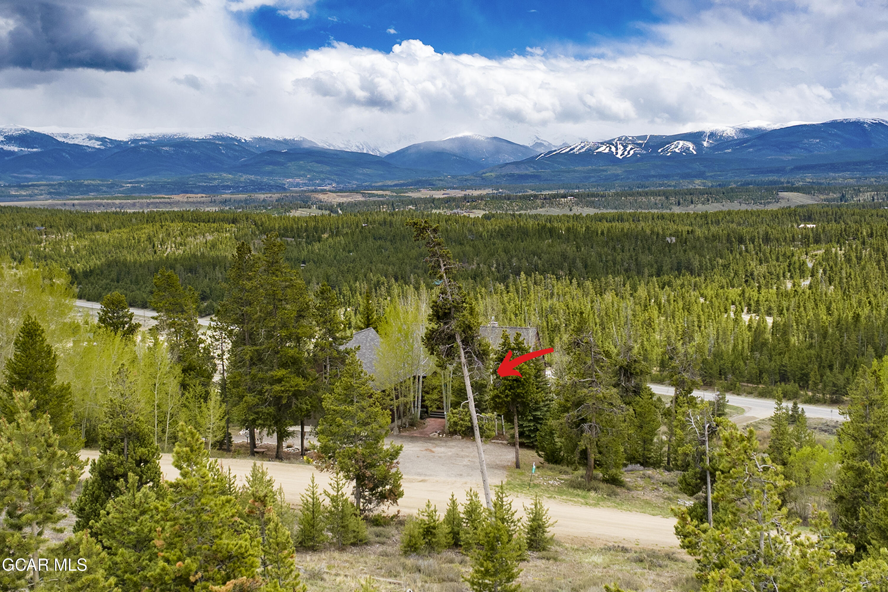 400 Ridge Road Tabernash, CO 80478 - Photo 45 of 50 a view of a lake with a mountain in the background