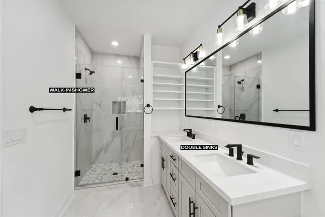 a bathroom with a sink a mirror and a toilet