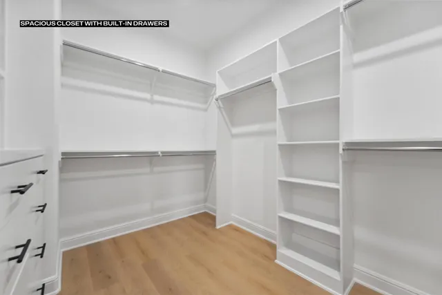 an empty room with windows and window