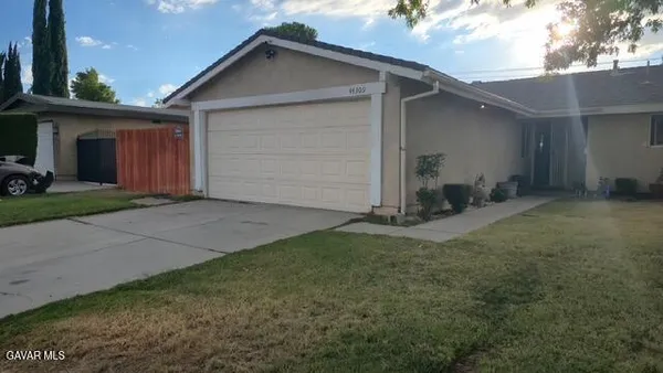 a view of backyard of house