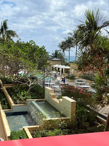 a view of a chairs and table in the patio