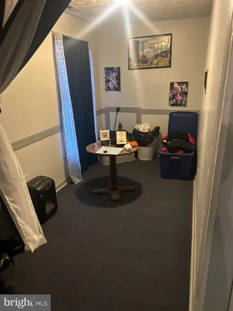 a view of a balcony with chairs