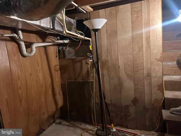 a bathroom with a shower and a sink