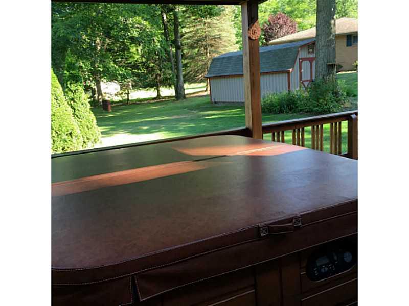 3430 Morefield Road Hermitage, PA 16148 - Photo 14 of 25 Yard/Garden. View from the covered deck showing Hot Tub, Yard, and Shed