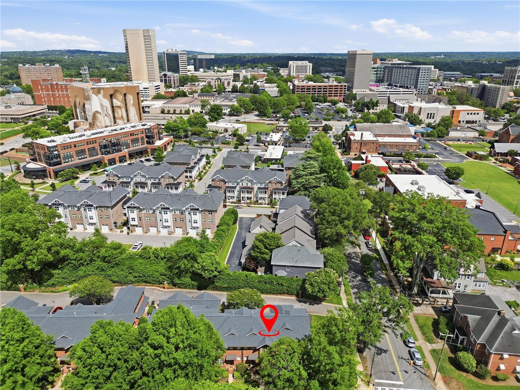 204 Butler Avenue Greenville, SC 29601 - Photo 26 of 26 An aerial perspective reveals a vibrant city center with diverse architecture and verdant tree-lined streets.