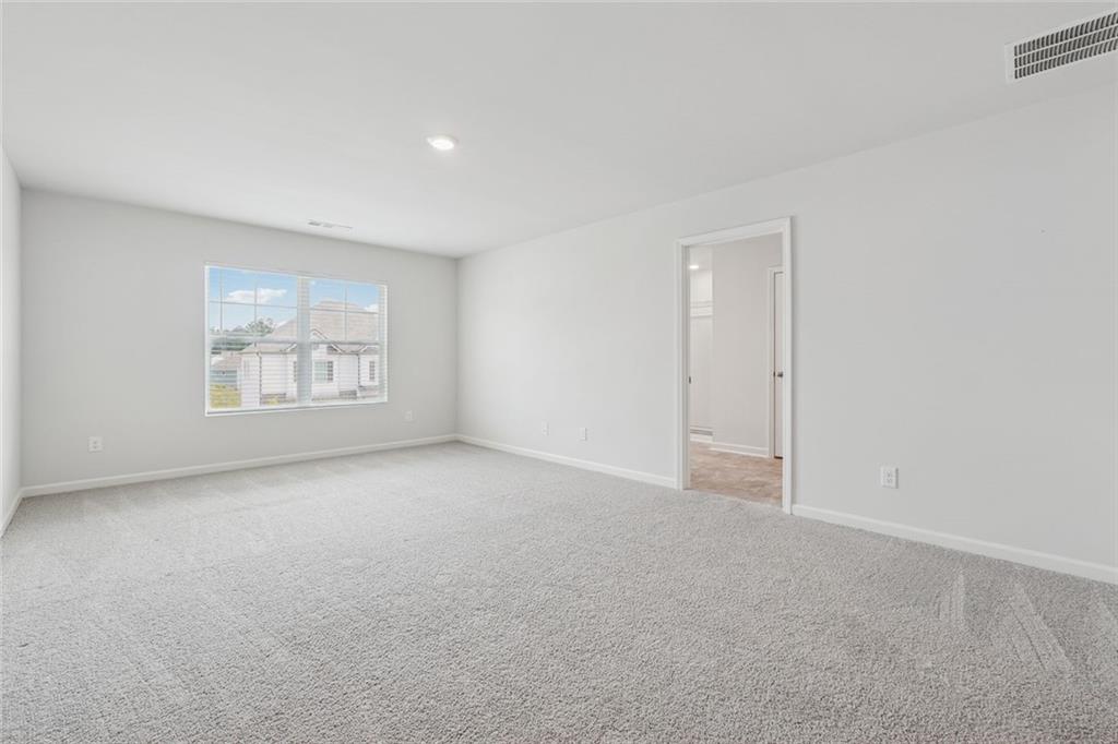 96 Quail Bend Way Dallas, GA 30157 - Photo 22 of 57 a view of an empty room with a window