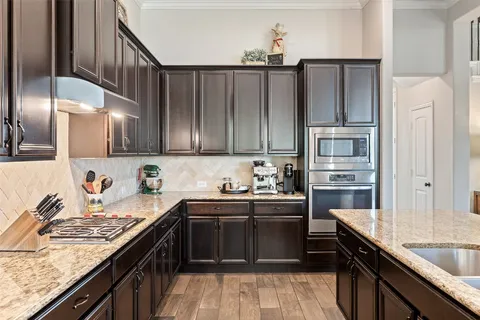 a view of a dining room with furniture and window
