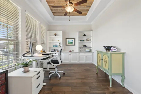 a kitchen with a sink cabinets and appliances