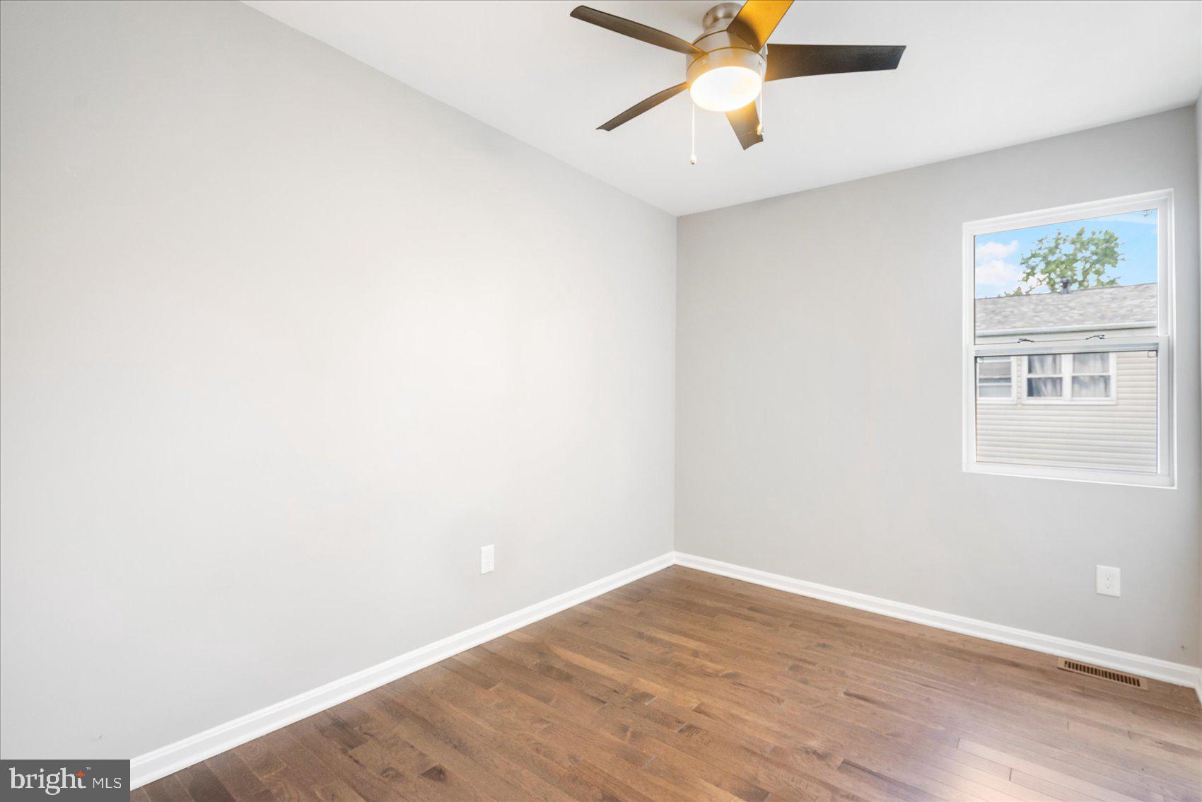1864 Simons Court Edgewood, MD 21040 - Photo 15 of 28 an empty room with windows and fan