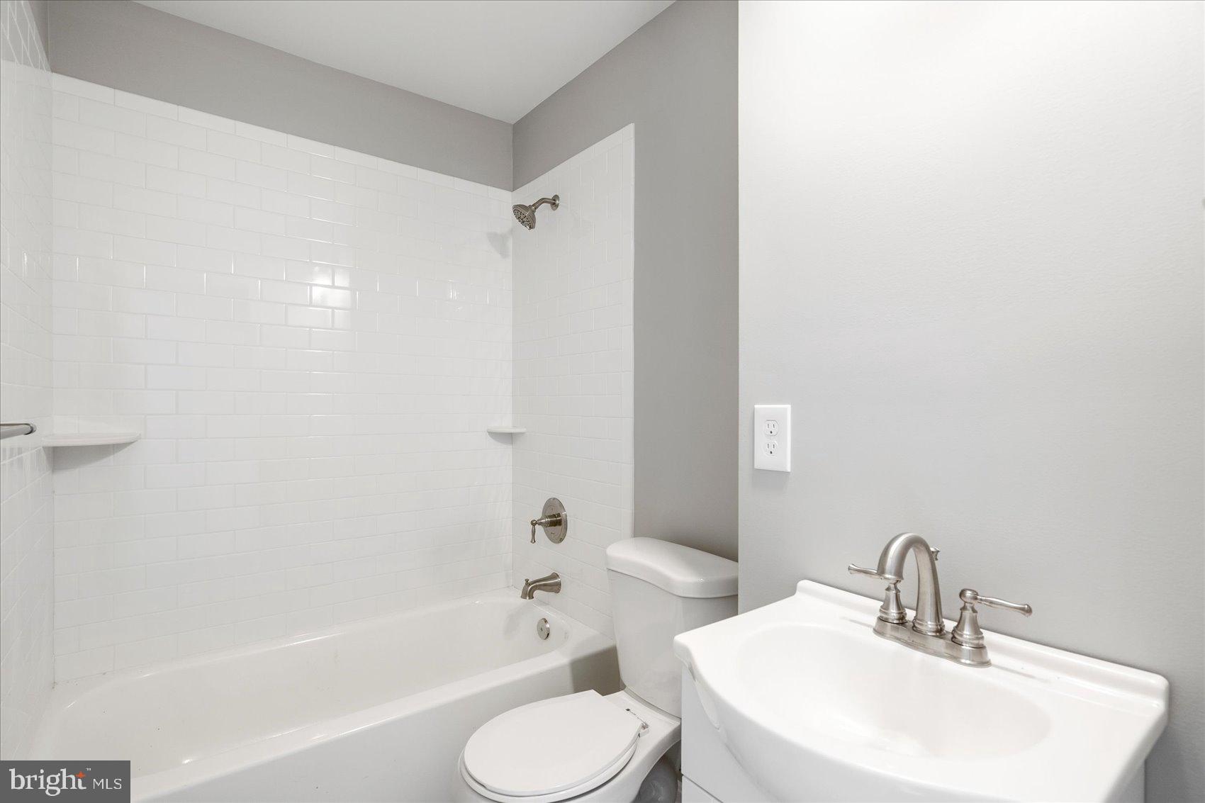 1864 Simons Court Edgewood, MD 21040 - Photo 20 of 28 a bathroom with a sink toilet and shower