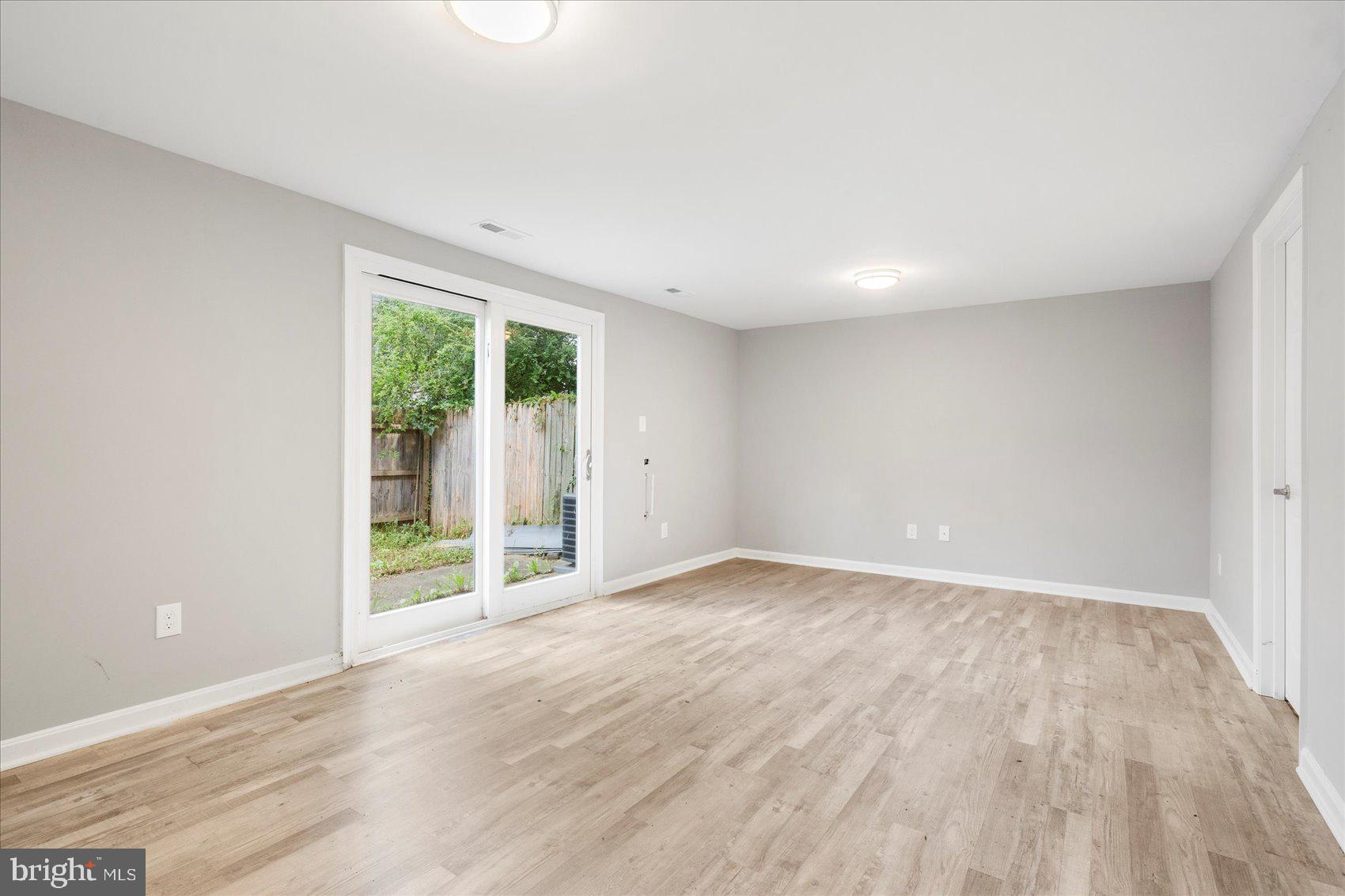 1864 Simons Court Edgewood, MD 21040 - Photo 23 of 28 wooden floor in an empty room with a window