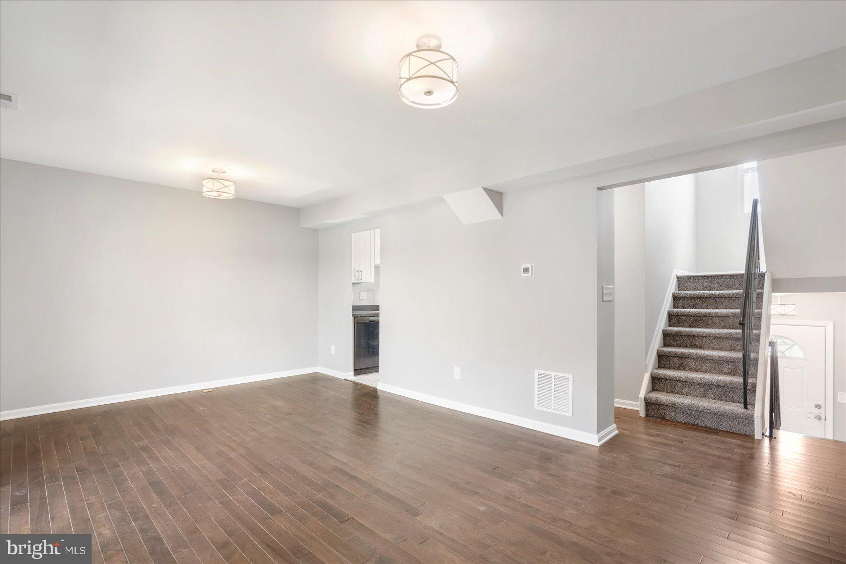 1864 Simons Court Edgewood, MD 21040 - Photo 4 of 28 a view of wooden floor and windows in a room