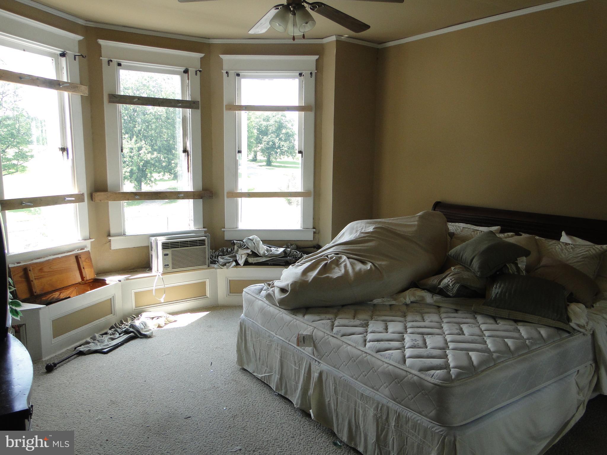 3019 Belair Road Baltimore, MD 21213 - Photo 7 of 11 a living room with furniture and a large window