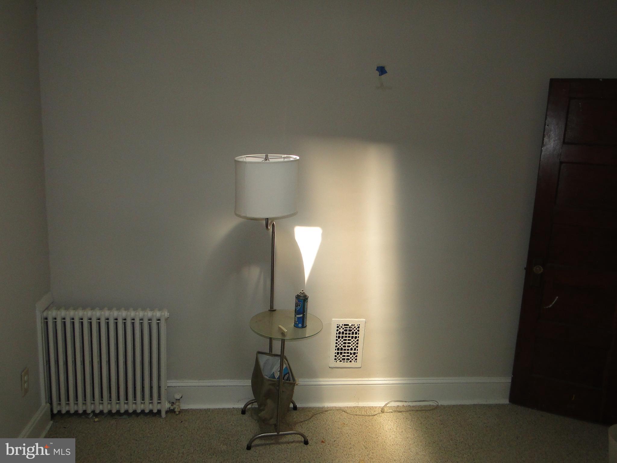 3019 Belair Road Baltimore, MD 21213 - Photo 10 of 11 a view of empty room with a window