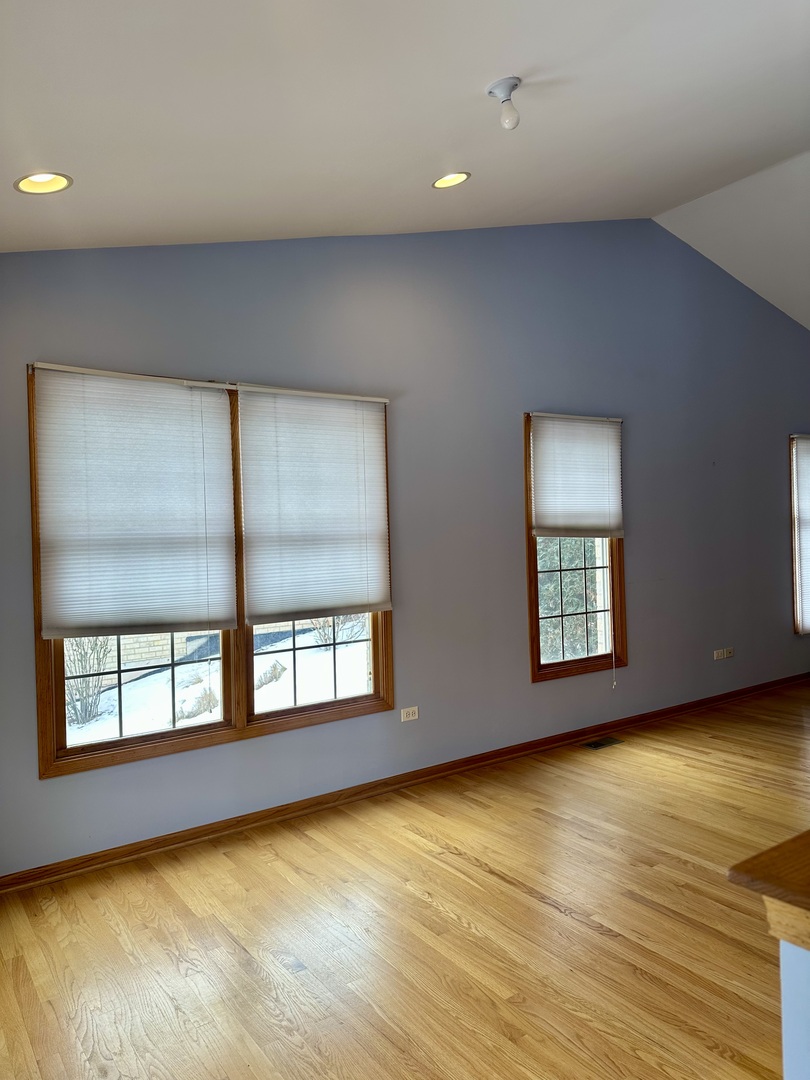 11904 Somerset Road Orland Park, IL 60467 - Photo 12 of 38 an empty room with windows