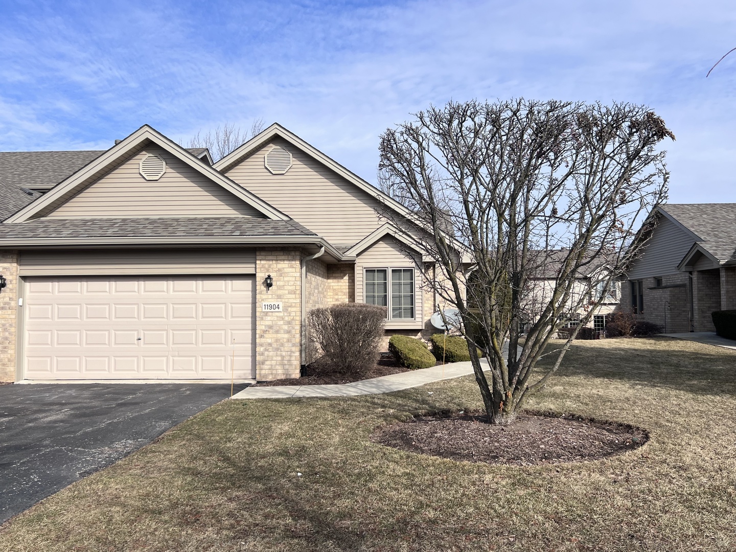 11904 Somerset Road Orland Park, IL 60467 - Photo 2 of 38 a front view of a house with a yard and garage