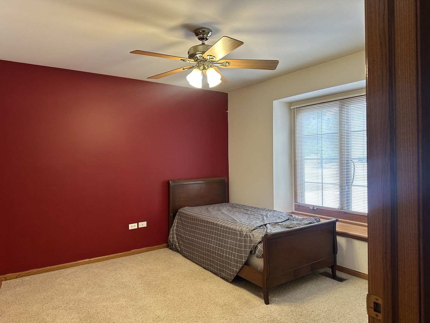 11904 Somerset Road Orland Park, IL 60467 - Photo 26 of 38 a bedroom with a bed and a ceiling fan