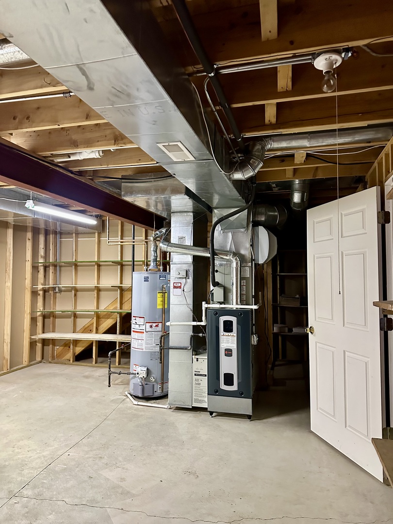 11904 Somerset Road Orland Park, IL 60467 - Photo 37 of 38 a view of an empty room with wooden shelves
