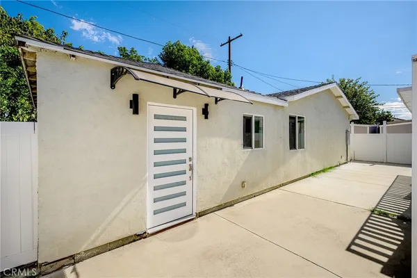 a front view of a house with a garage