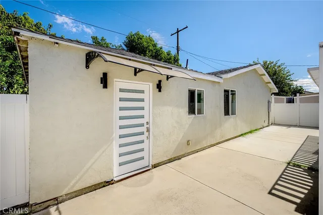 a front view of a house with a garage
