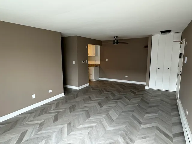 a view of a big room with a bathroom