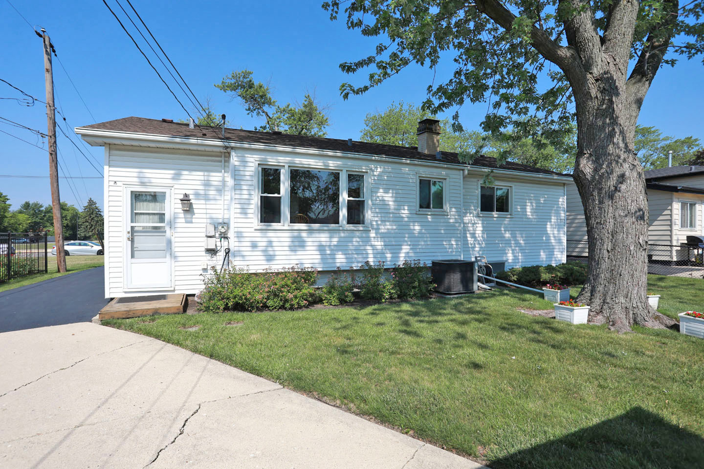 645 South Ardmore Avenue Addison, IL 60101 - Photo 24 of 28 a front view of house with yard and green space
