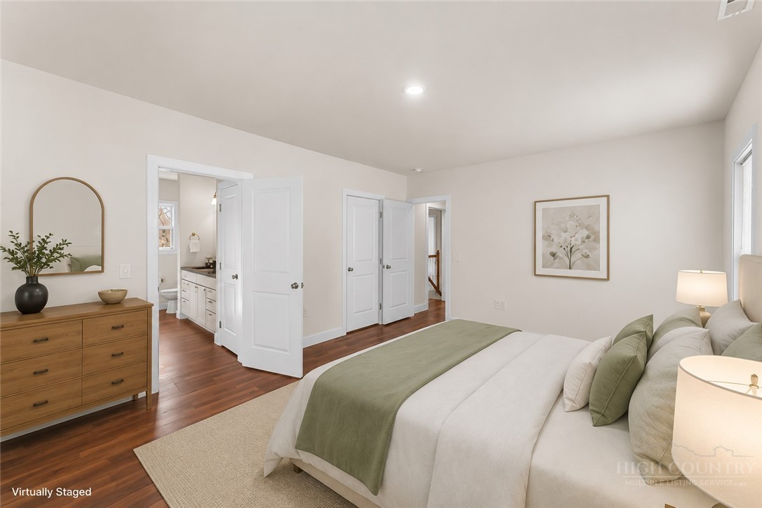 262 Old Bristol Road Boone, NC 28607 - Photo 8 of 26 a spacious bedroom with a bed and a dresser