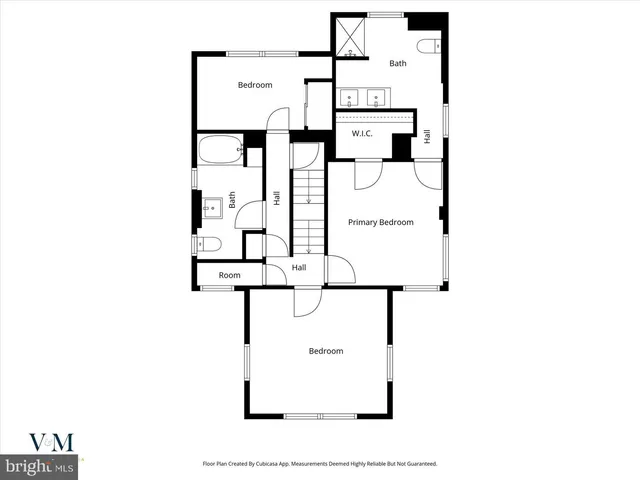 a picture of a bench in front of a gate