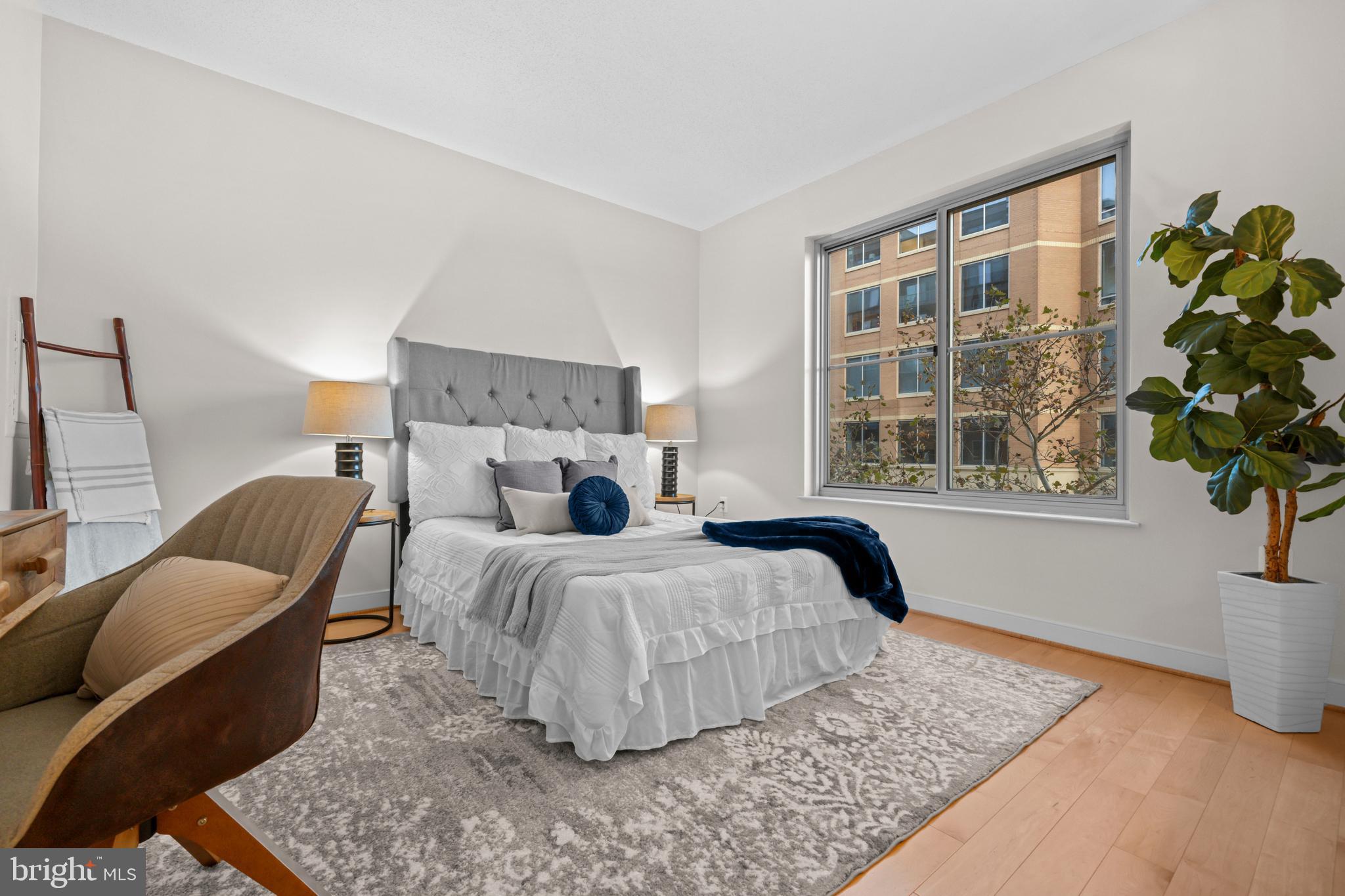 820 North Pollard Street, Unit 307 Arlington, VA 22203 - Photo 15 of 29 a bedroom with bed and a window