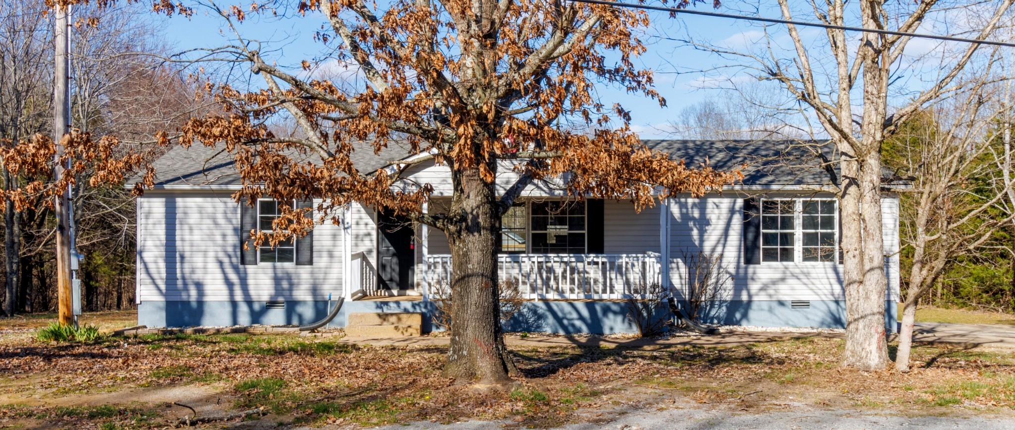 1835 Jim Kim Road Palmyra, TN 37142 - Photo 27 of 36 a view of a house with a yard
