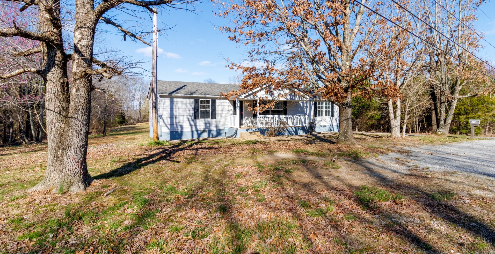 1835 Jim Kim Road Palmyra, TN 37142 - Photo 29 of 36 a view of a yard with a tree